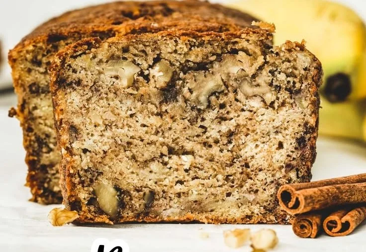 Delicious banana bread with walnuts on a rustic wooden table