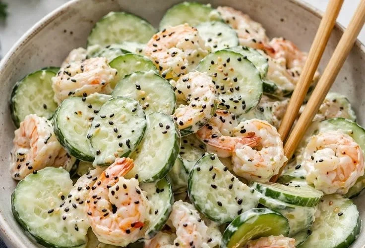 California Roll Inspired Cucumber Salad with fresh vegetables and sushi flavors.