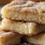 Freshly baked Cinnamon Sugar Blondies topped with a sweet cinnamon sugar mixture.