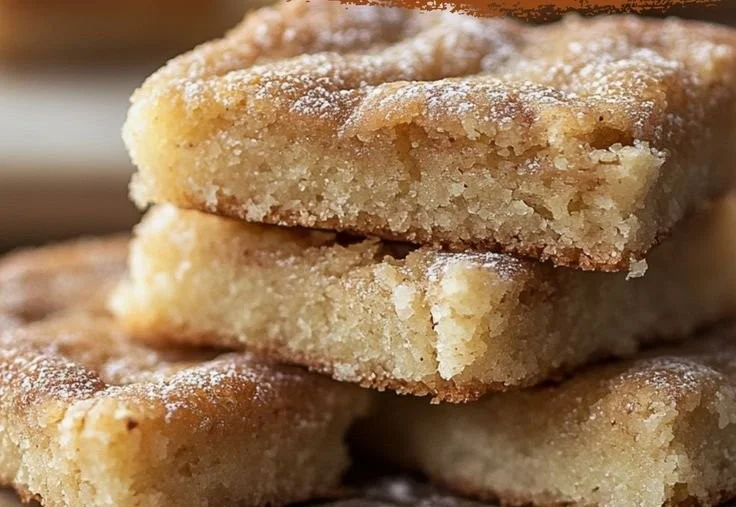 Freshly baked Cinnamon Sugar Blondies topped with a sweet cinnamon sugar mixture.