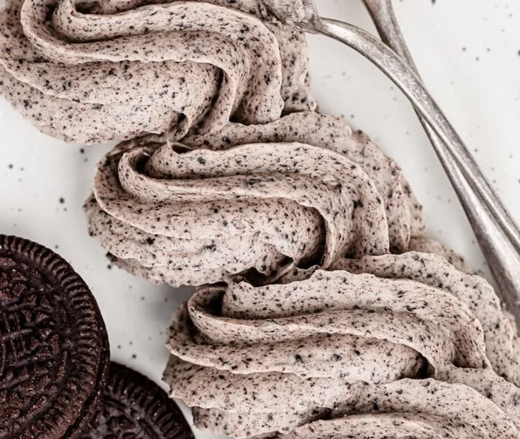 Delicious Cookies and Cream Frosting on a chocolate cupcake