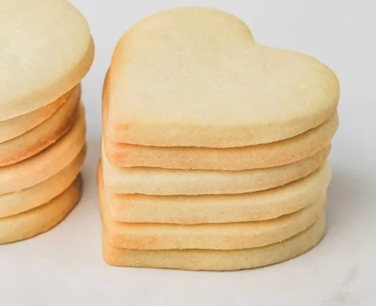 Freshly baked easy sugar cookies on a cooling rack