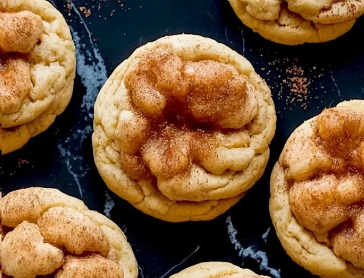 Delicious Eggnog Snickerdoodles on a festive plate decorated for the holidays.