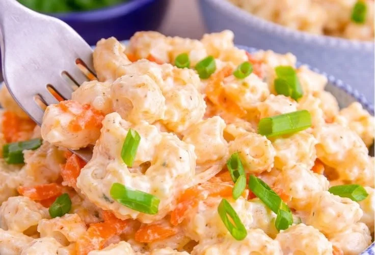 Delicious Hawaiian macaroni salad served in a bowl with colorful vegetables
