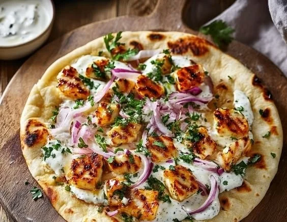 Hot Honey Halloumi Pitas served with fresh vegetables and drizzled with hot honey