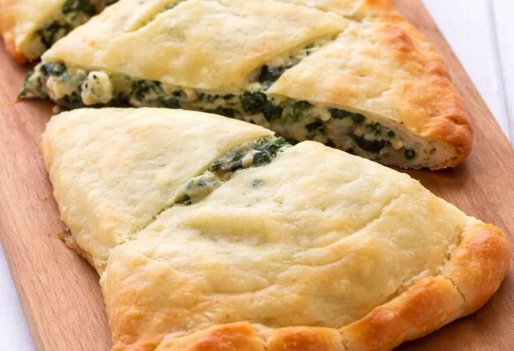 Delicious Keto Spinach Artichoke Pizza on a plate, healthy and low-carb.