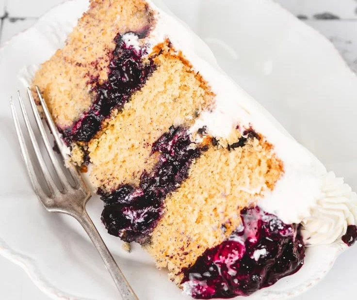 Delicious homemade Lemon Blueberry Cake with fresh blueberries and lemon zest