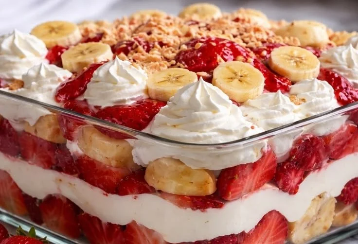 A delicious slice of Strawberry Crunch Cheesecake and Banana Pudding Cheesecake