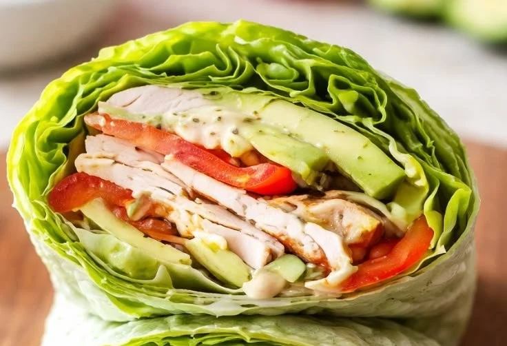 Delicious Thai Turkey Lettuce Wraps topped with fresh herbs and veggies