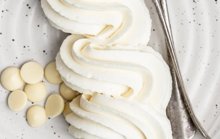 Delicious white chocolate whipped ganache ready for dessert decoration