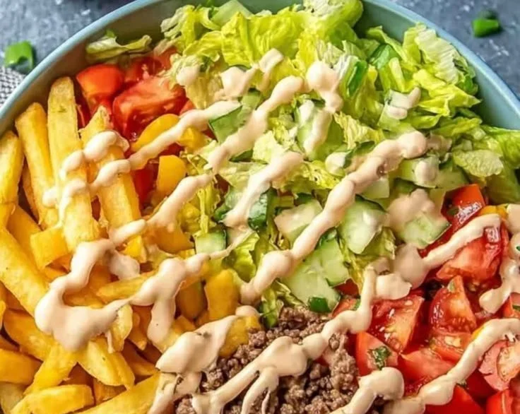 Big Mac Bowls with layers of beef, cheese, lettuce, and special sauce