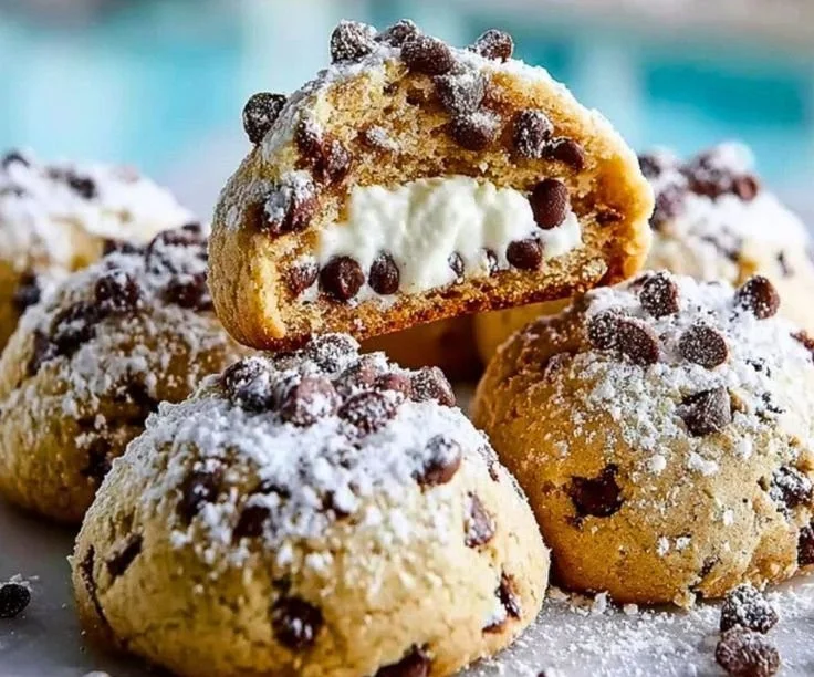 Delicious cannoli cookies with creamy filling and chocolate chip topping.