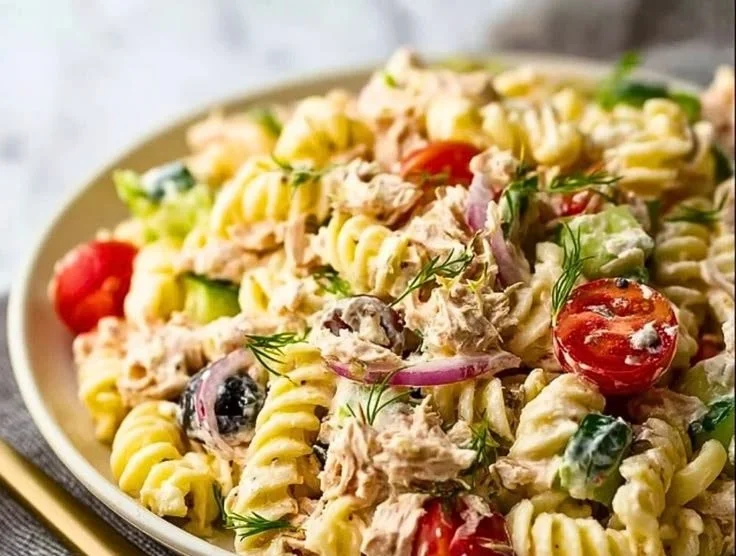 Chilled tuna pasta salad with vegetables in a bowl