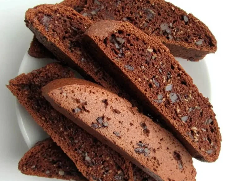 Delicious chocolate espresso biscotti on a plate, perfect for coffee pairing.