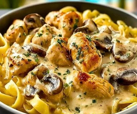 Creamy Chicken Stroganoff served on a plate with garnishes