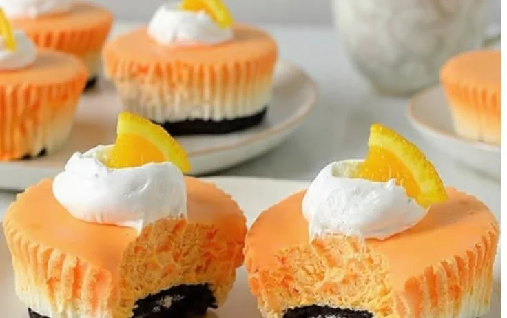 Delicious creamy mini cheesecakes garnished with fresh fruit