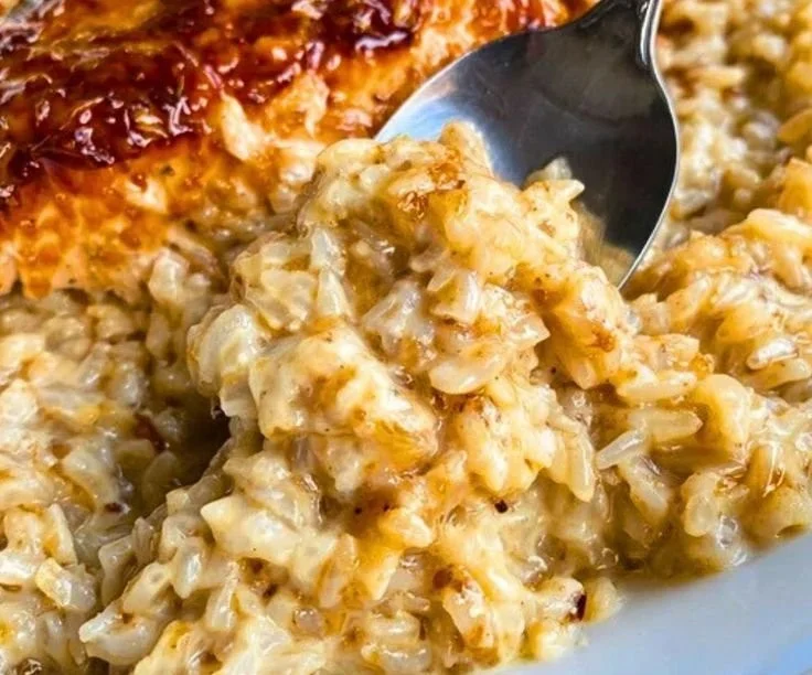 Creamy Rice and Chicken Bake in a casserole dish ready to serve