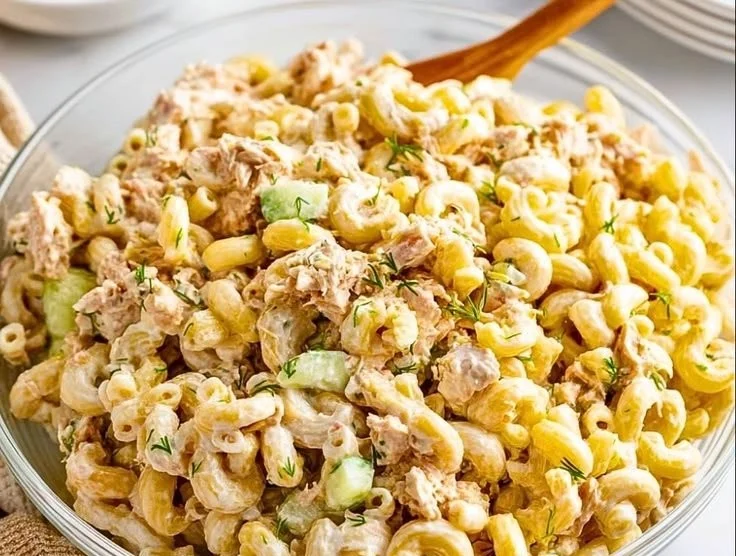 Bowl of easy Tuna Macaroni Salad with fresh vegetables and a creamy dressing