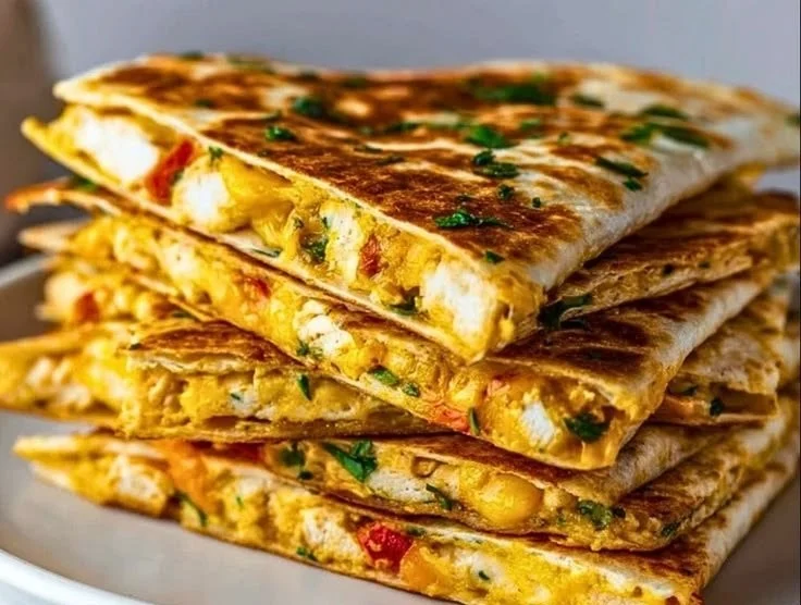 High-protein quesadilla filled with healthy ingredients on a plate