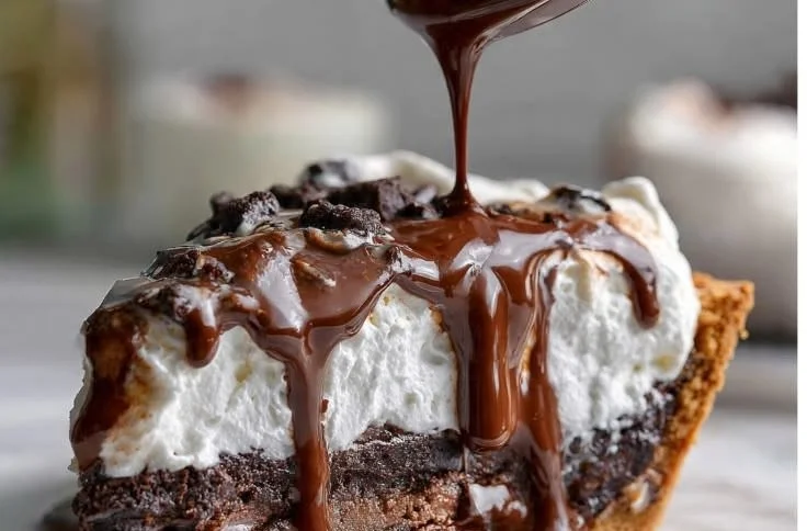 Delicious Mississippi Mud Pie with chocolate, marshmallows, and graham cracker crust