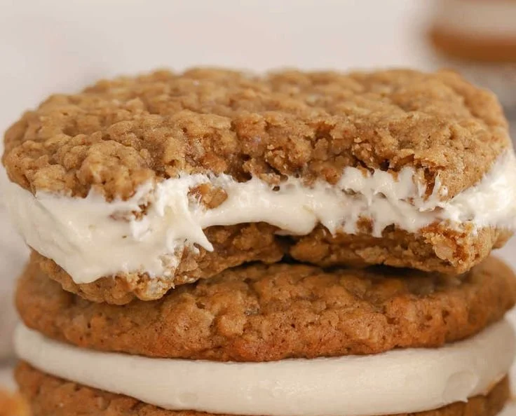Delicious Oatmeal Creme Pies, classic cookie sandwich filled with creamy frosting.
