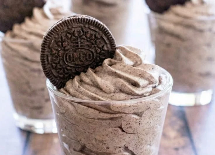 Delicious homemade Oreo mousse dessert topped with crushed Oreos