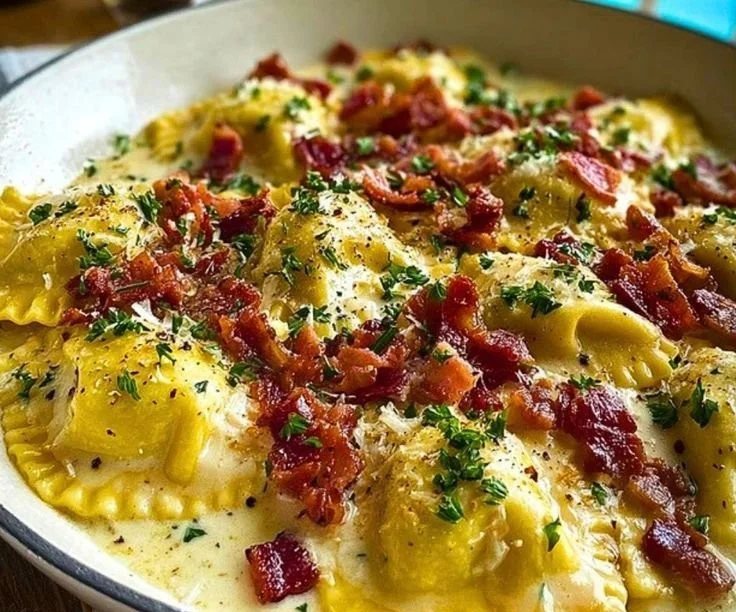 Delicious Ravioli Carbonara garnished with parsley and Parmesan cheese