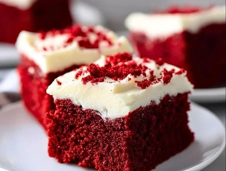 Homemade Red Velvet Snack Cake with cream cheese frosting on a plate