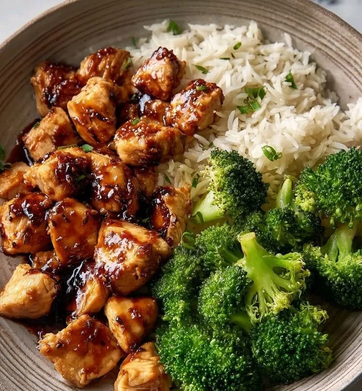 Delicious teriyaki chicken served with rice and vegetables