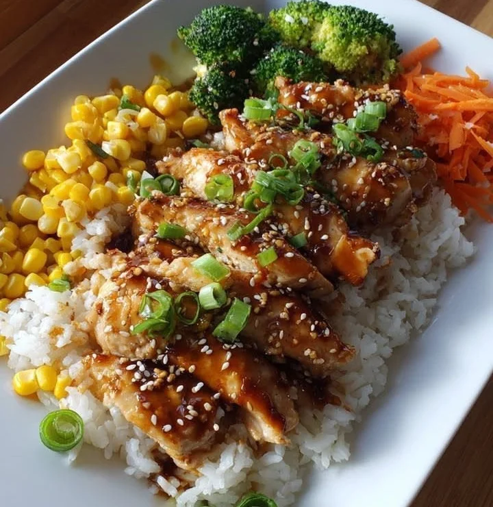 Teriyaki chicken rice bowl with fresh vegetables