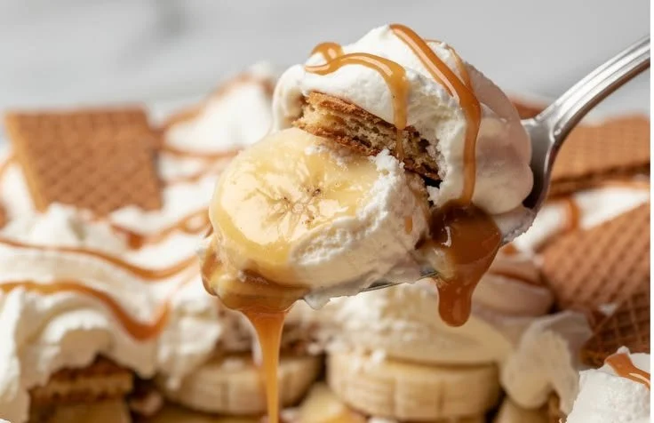 Delicious Banana Cream Trifle with layers of pudding, bananas, and whipped cream