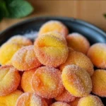 Croatian Peach Cookies, a sweet treat with peach filling and a soft cookie shell