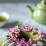 A slice of Matcha Pound Cake on a plate, showcasing its green color and texture.