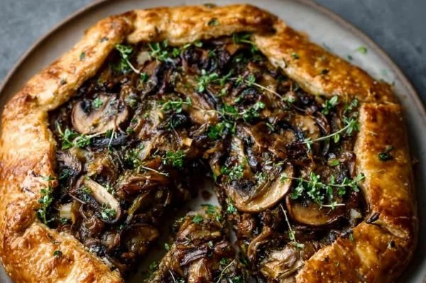 Mushroom Leek Galette with Puff Pastry on a wooden table